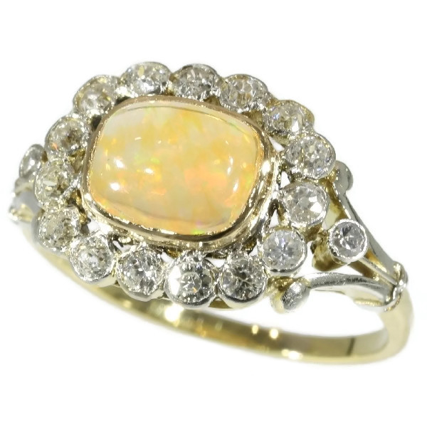 Belle Epoque vintage engagement ring with fire opal and old mine cut diamonds